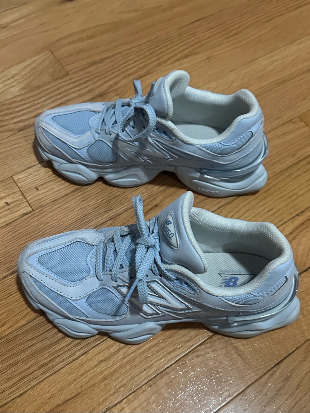 New Balance women’s size 8 9060 light blue sneakers